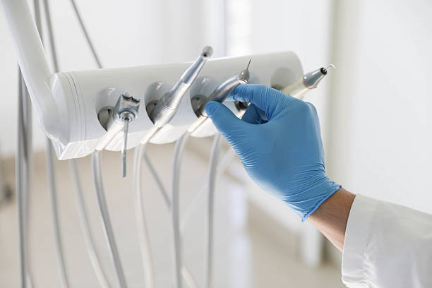 Professional Tooth Extraction technician working in Irving, TX